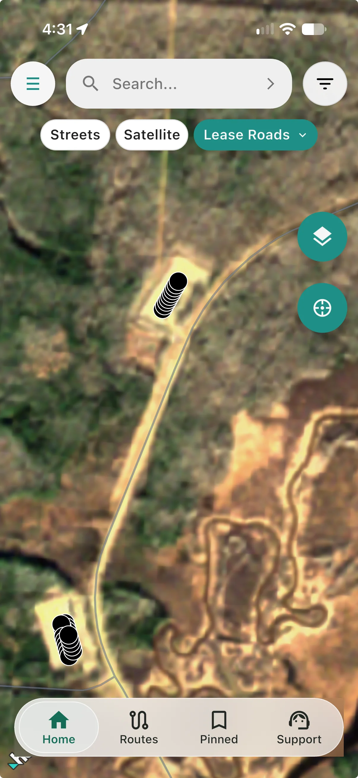 Lease Roads selected; the cleared pad and approach road are visible at the same location