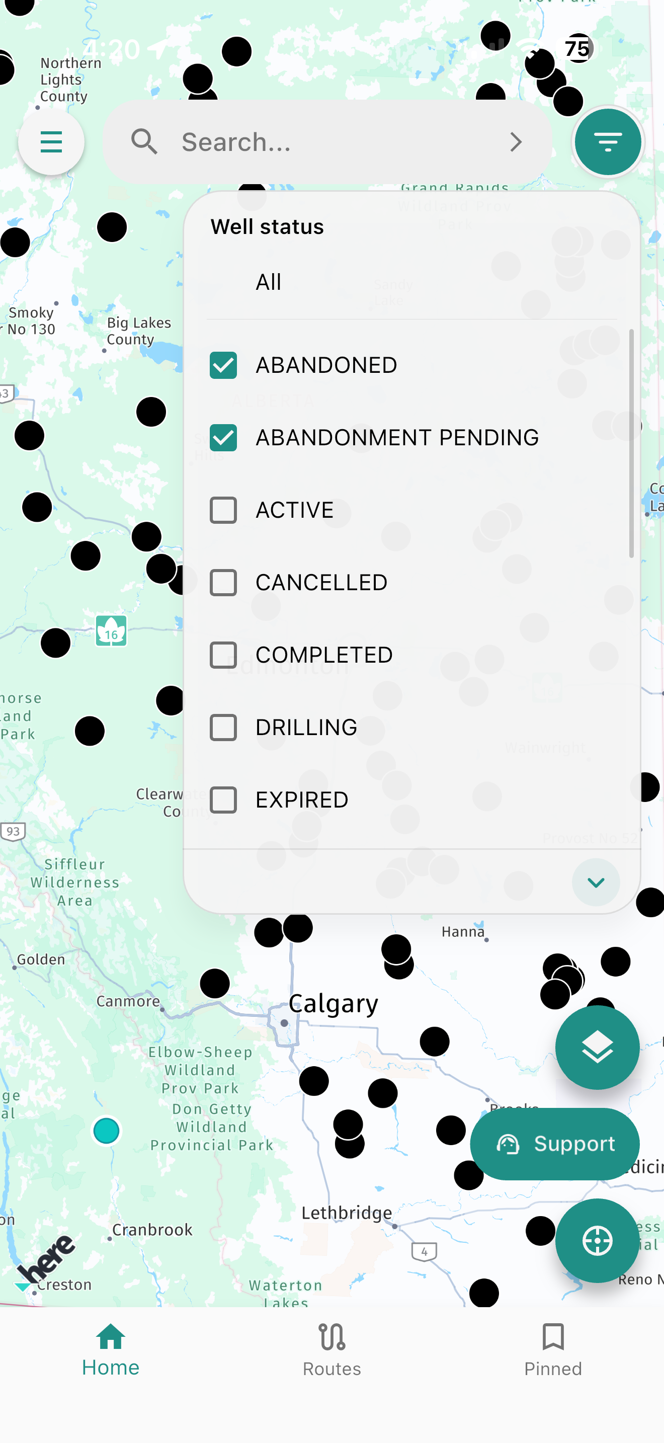 Oilfield Route map with the Well status filter panel open and abandoned and abandonment pending selected